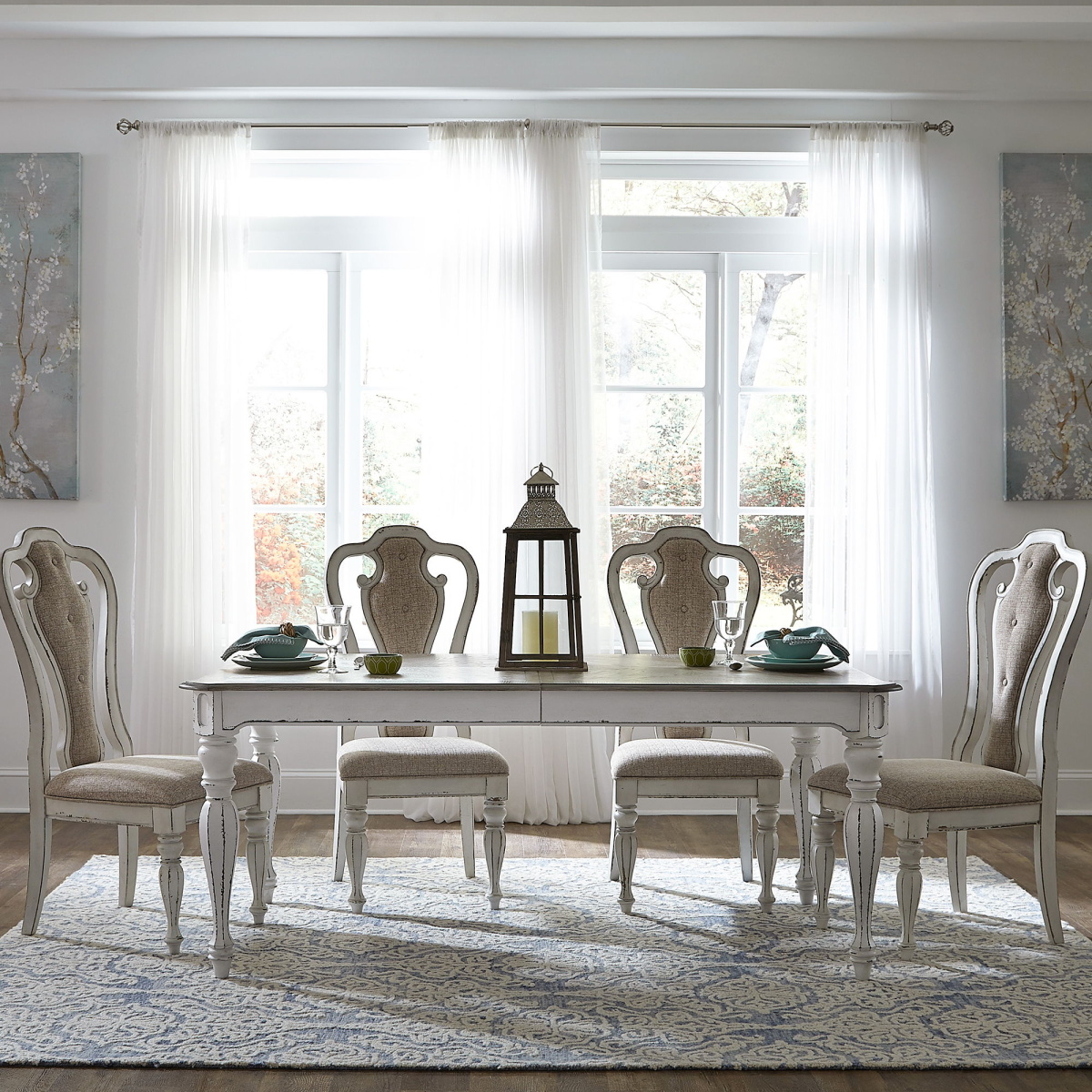 cc8eac08f00e80173c3bbcbaaba54f87 Magnolia Manor - 5 Piece Rectangular Table Set - White - Upholstered Chairs - Image 1