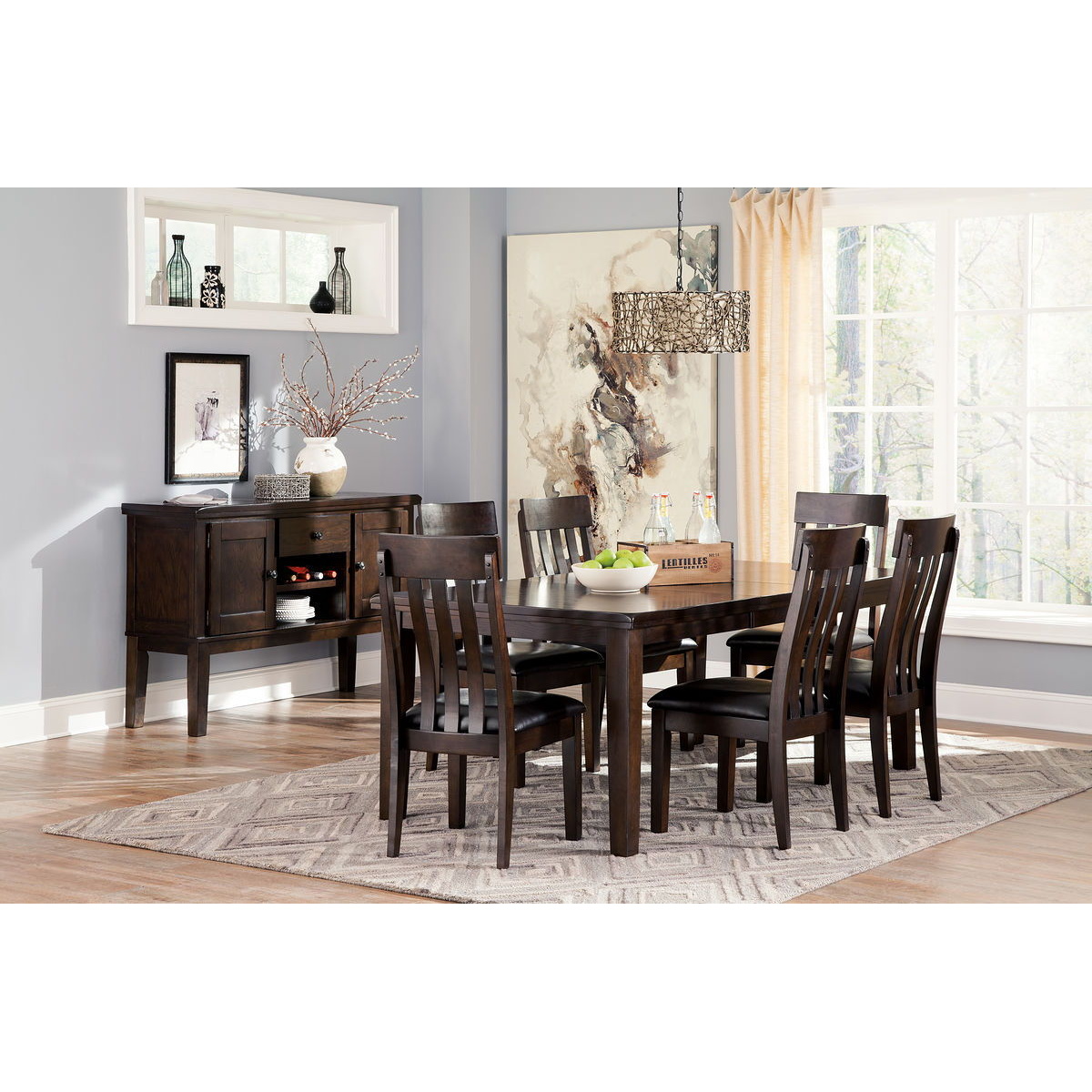 f0b126454bc3bcdc2e2e481db1acbc3d Haddigan - 7 Pc. - Extension Table, 6 Side Chairs - Dark Brown - Image 1