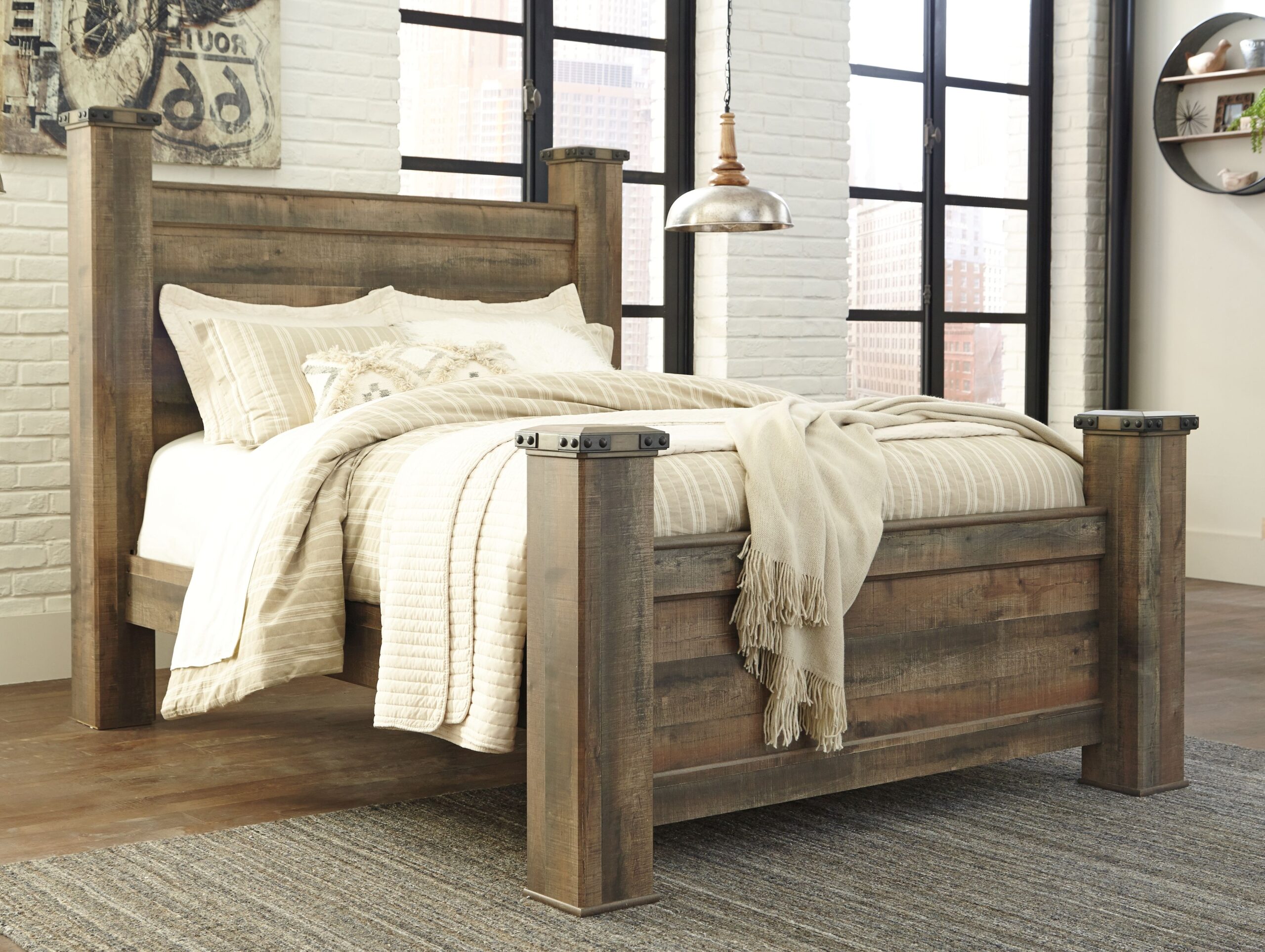 Trinell - Queen Poster Bed - Brown