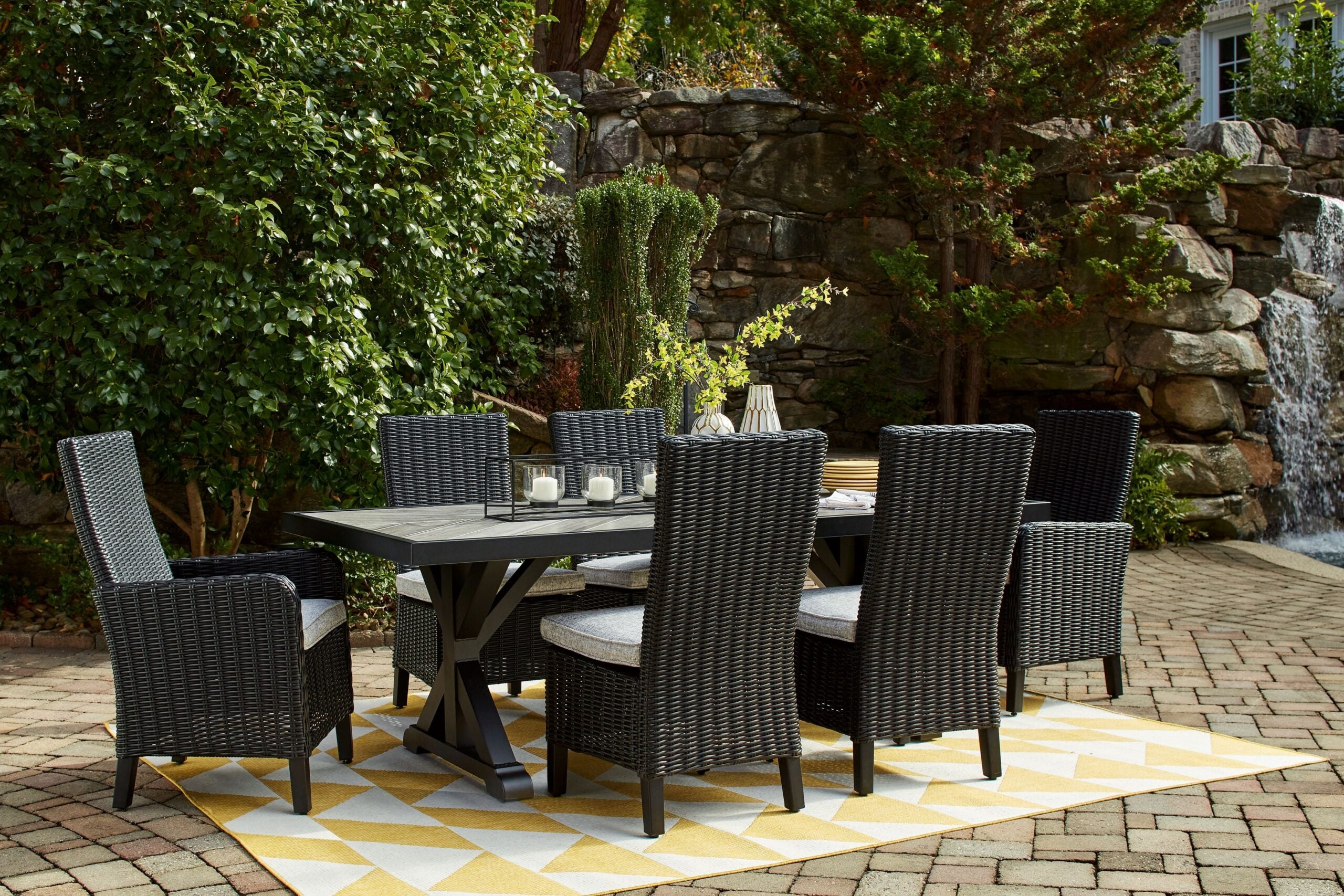 Beachcroft - 7 Pc. - Outdoor Dining Table, 4 Side Chairs, 2 Arm Chairs - Black / Light Gray
