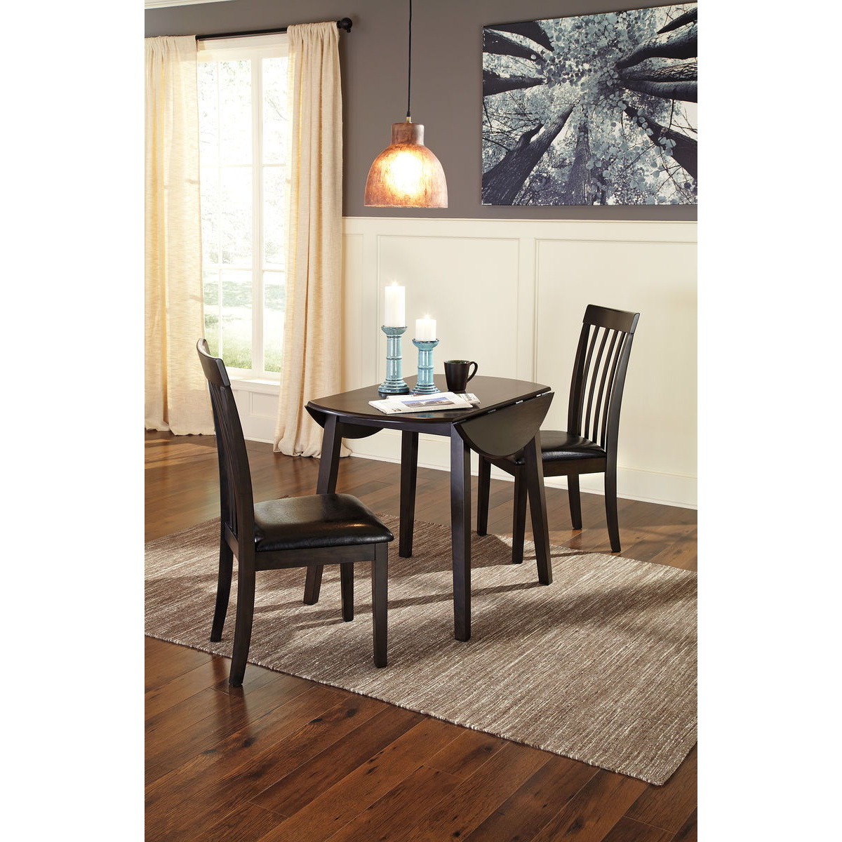 bbe3766351dcd68ef0a279618b09044e Hammis - 3 Pc. - Drop Leaf Table, 2 Upholstered Side Chairs - Dark Brown - Image 1