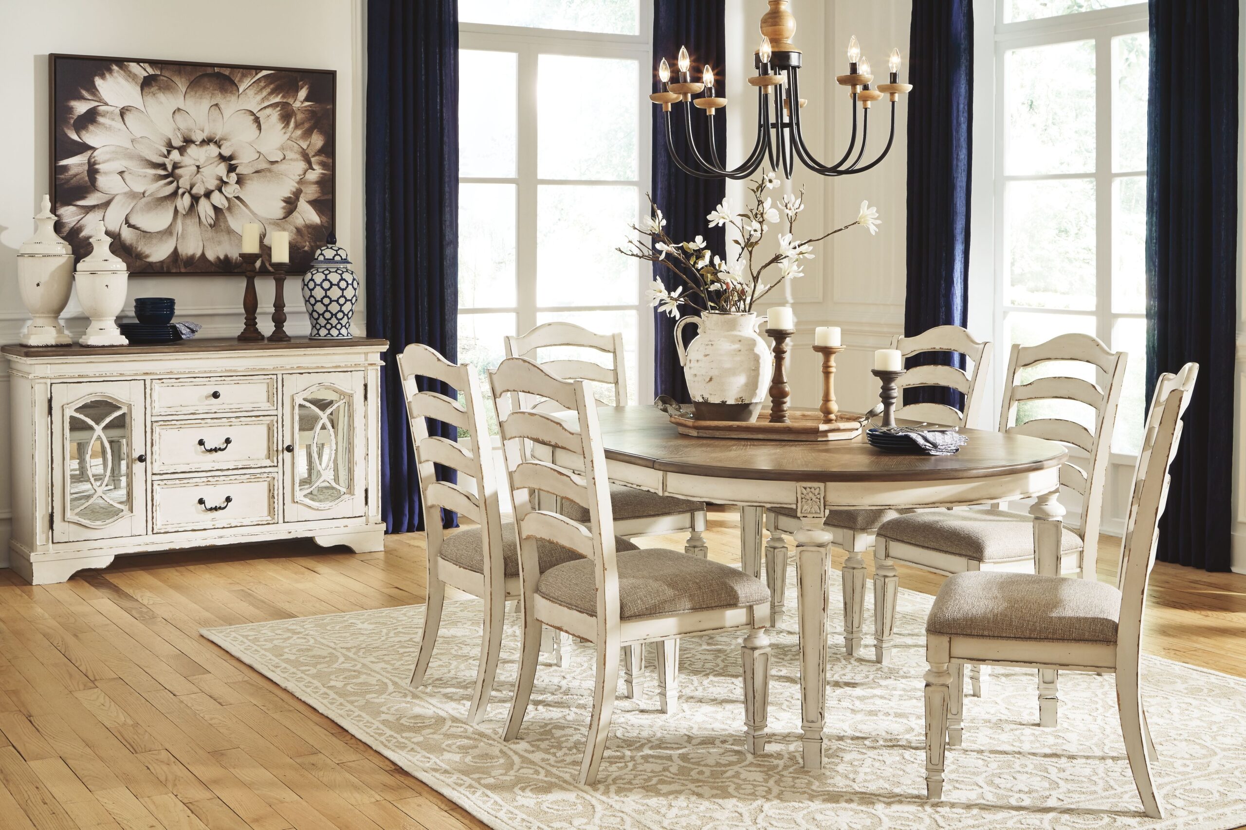 Realyn - 7 Pc. - Oval Extension Table, 6 Ladderback Side Chairs - White