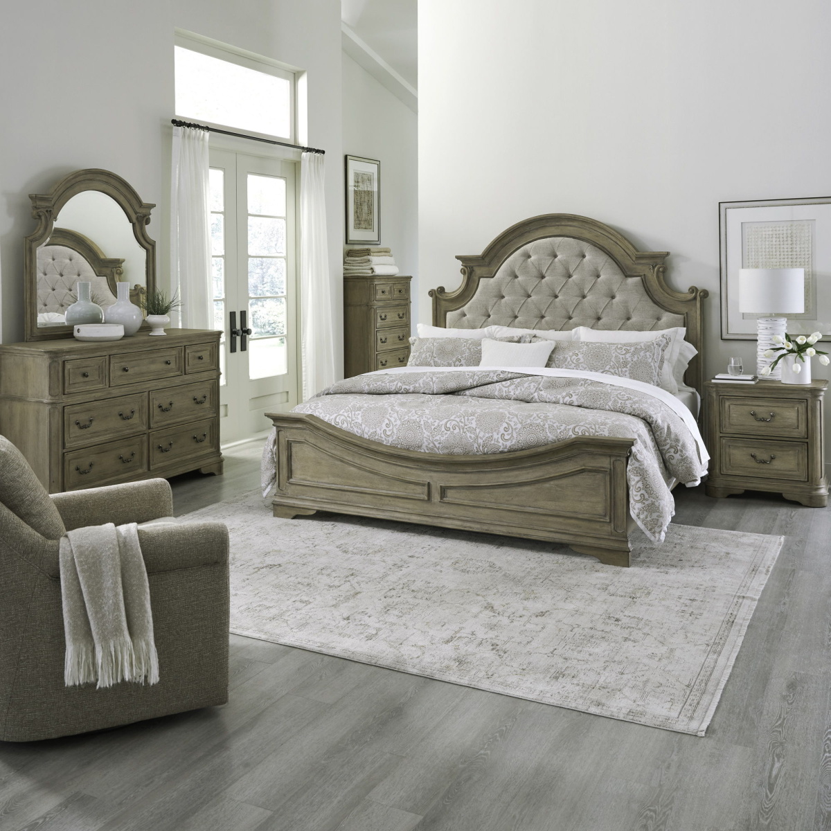 83cc66b1113f8f01353f764d430548b4 Magnolia Manor - 5 Piece Bedroom Set (Queen Upholstered Bed, Dresser & Mirror, Chest, Nightstand) - Light Brown - Image 1