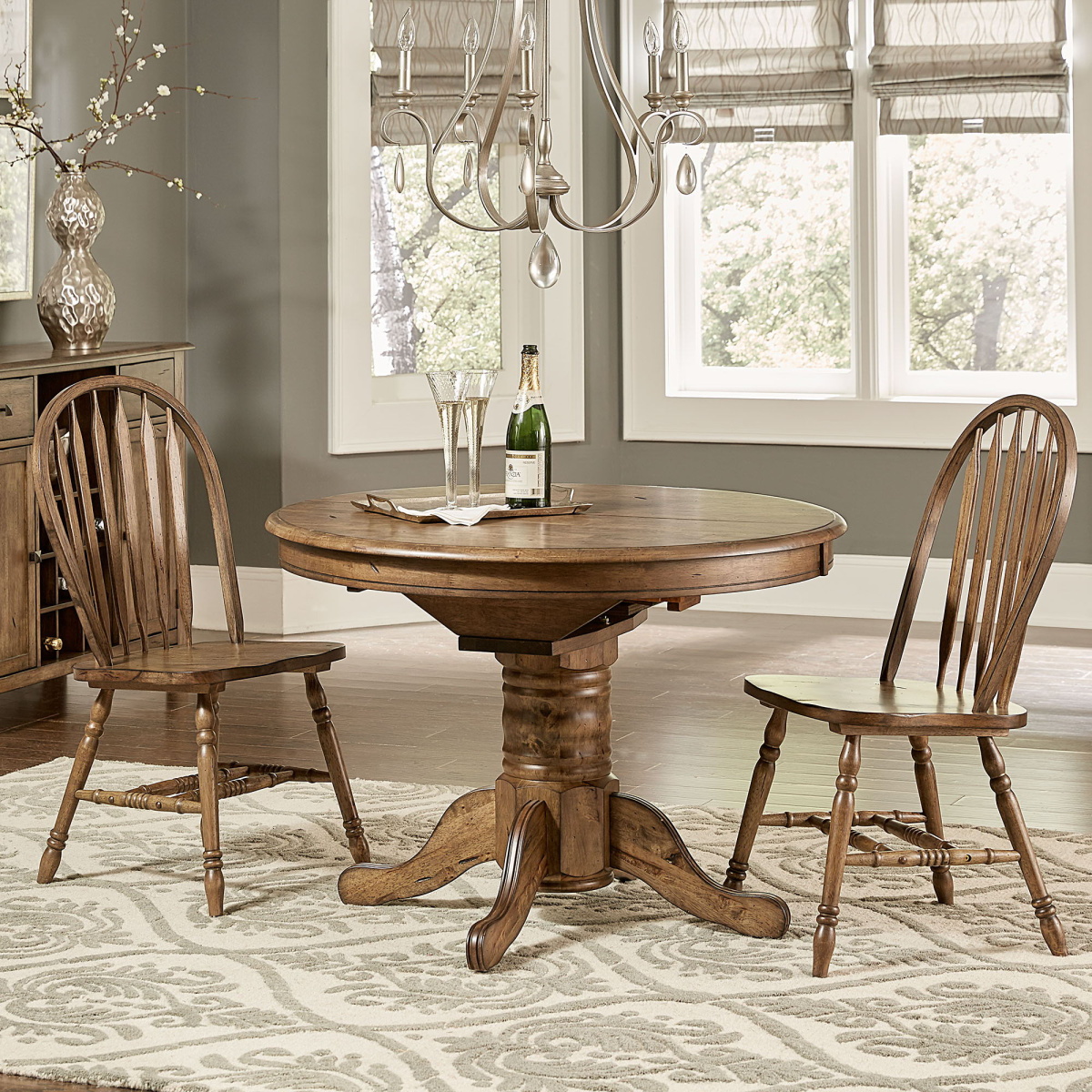 ceacb51fbd43d38c24ffb4eb83663690 Carolina Crossing - 3 Piece Round Table Set - Dark Brown - Image 1
