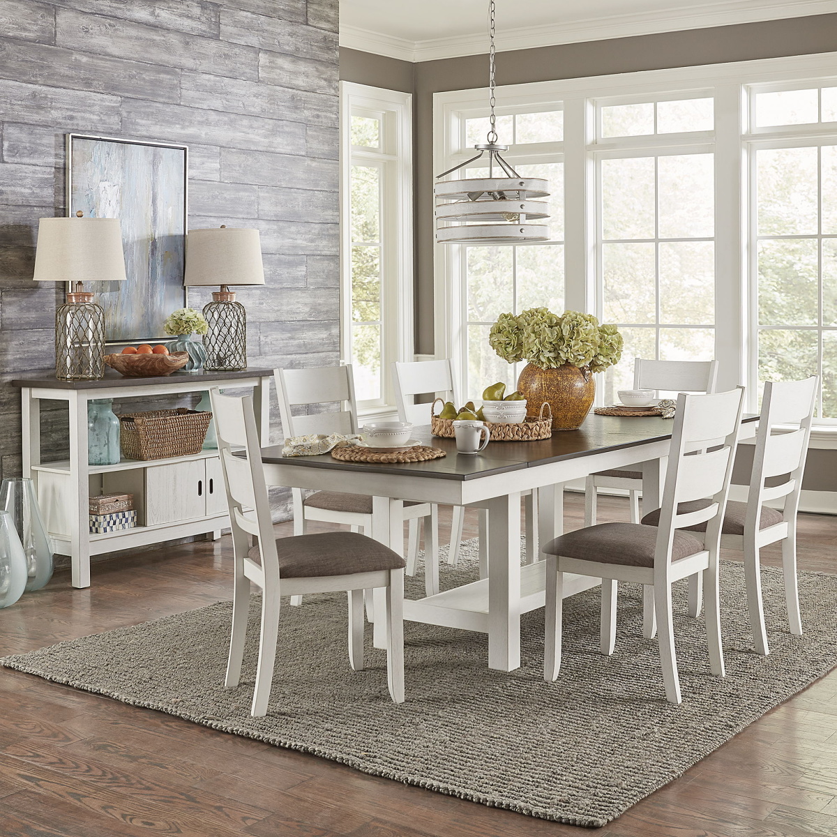 dda88f0673b3fd99c8fbdadc14ab9fd4 Brook Bay - 7 Piece Trestle Table Set - Textured White / Carbon Gray - Image 1
